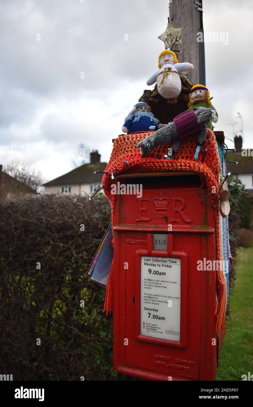 Guerilla knitting - a Christmas nativity scene on a post box in Hockliffe, Bedfordshire. Stock Photo