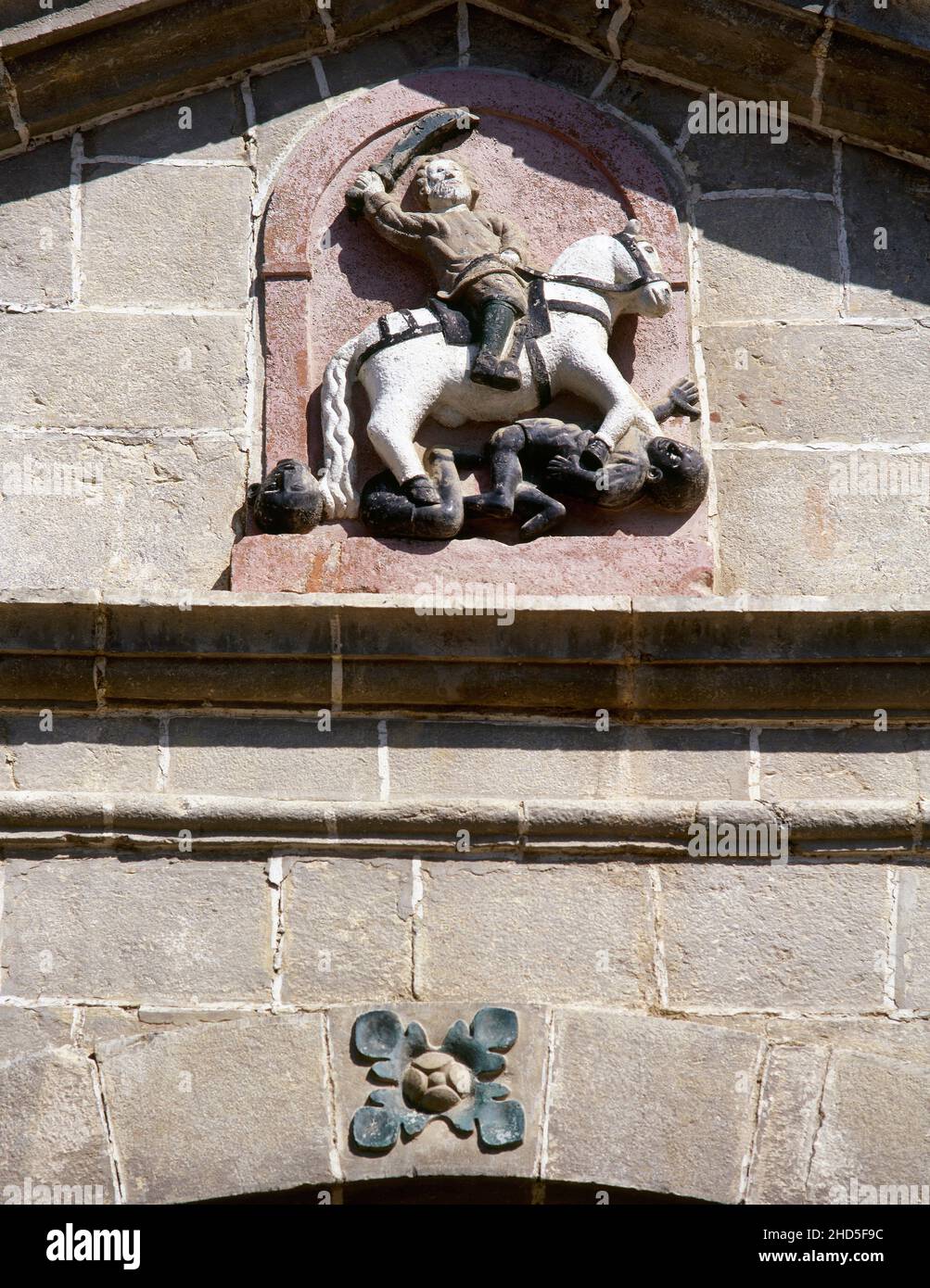 Spain, Basque Country, province of Biscay, Zeberio (Ceberio). Saint James the Moor-slayer (Santiago Matamoros) on horseback victorious over the infidels. Sculpture in the tympanum of the Chapel of Saint Anthony of Padua. Stock Photo