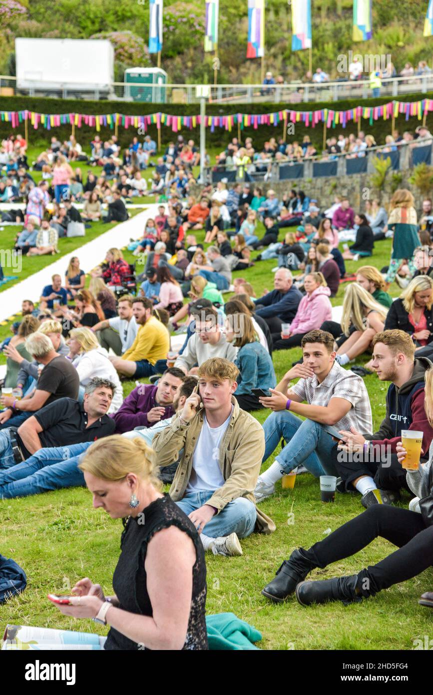 Audience gathering before a sold out performance by Ben Howard at the opening Eden Session at the Eden Project in Cornwall. Stock Photo