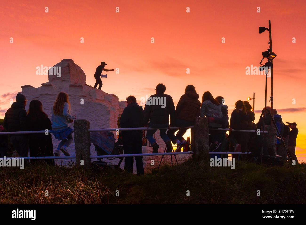 Poets from all over Cornwall gathered together for SproutSpoken a celebration in Newquay of poetry at the iconic Huer's Hut at sunset to celebrate National Poetry Day. Stock Photo