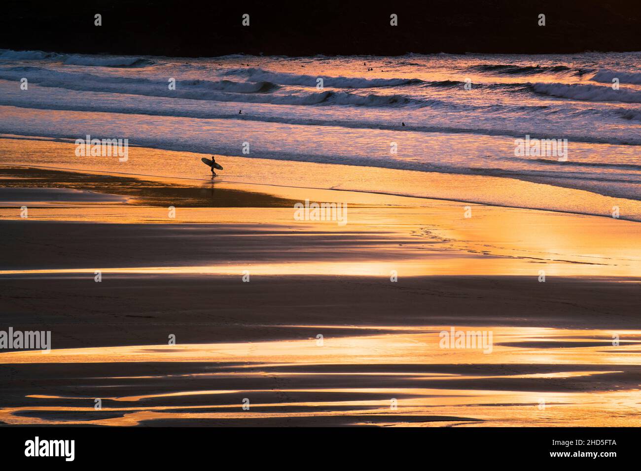 A golden sunset over Fistral in Newquay in Cornwall. Stock Photo