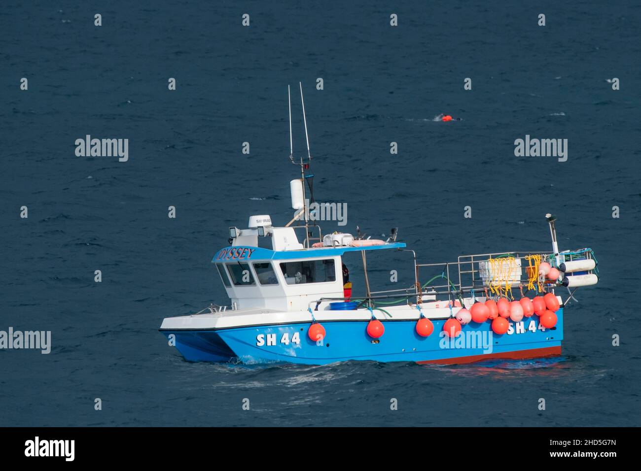The fishing boat Odyssey SH44 working in Newquay Bay on the North Cornwall coast. Stock Photo