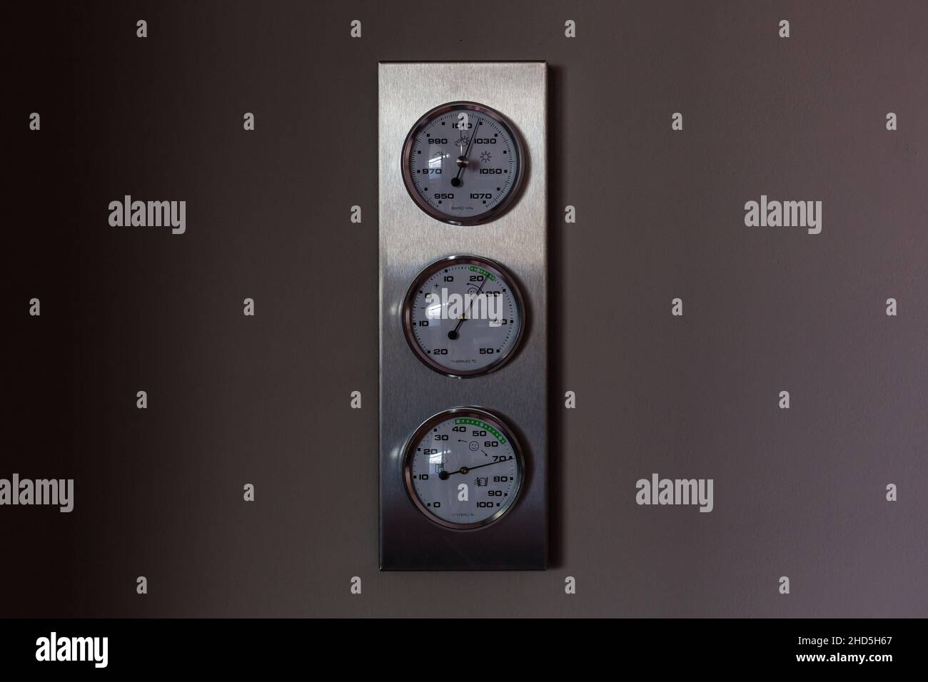 Round barometer, thermometer, hygrometer. Analog device for measuring