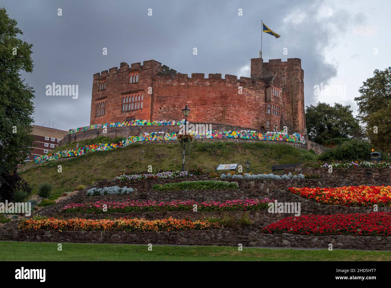 Tamworth Castle above the flower beds. Stock Photo