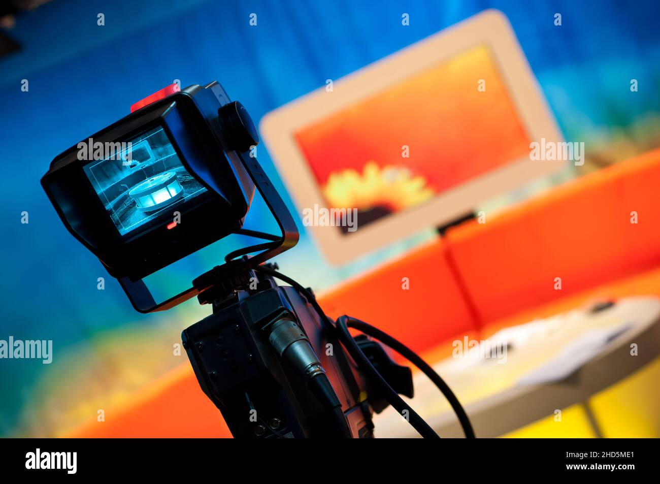 Video camera viewfinder recording show in TV studio focus on camera