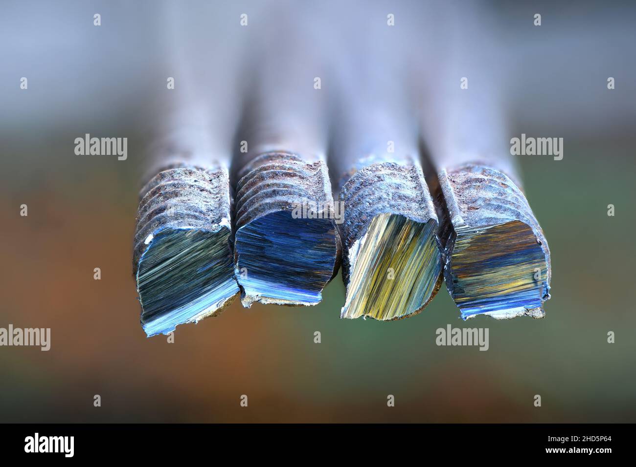 Metal bar cutting. A metal bar cut by a grinder. High resolution photo