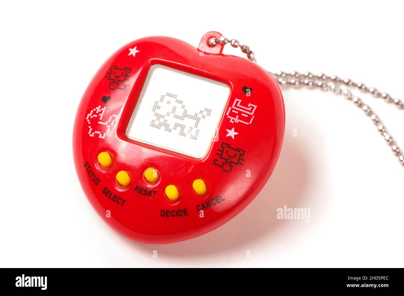 Retro virtual pet care game tamagotchi from 90's isolated on the white background Stock Photo