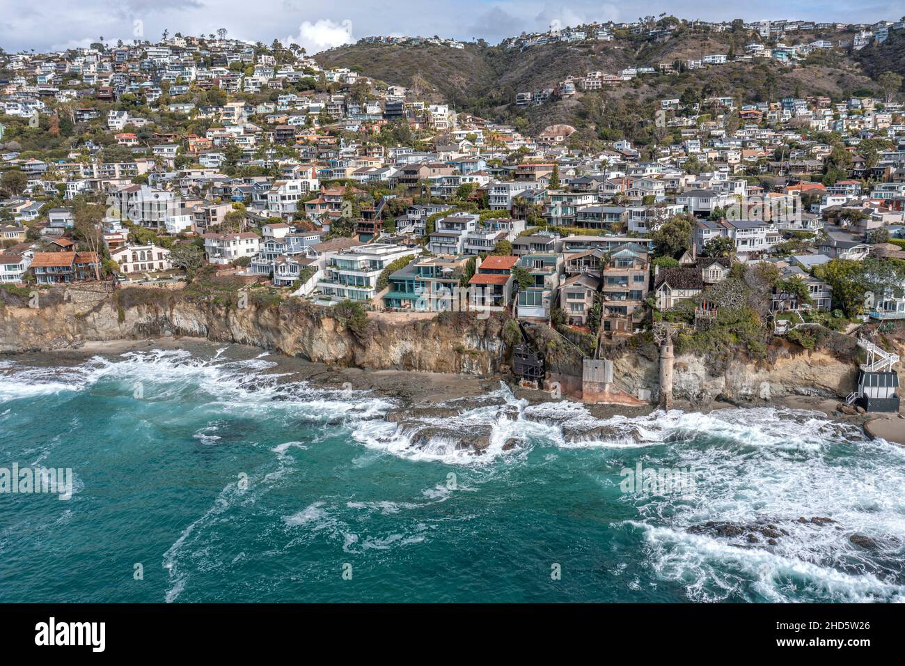 Coastal view of an affluent, wealthy community in Laguna Beach, California shows the spectacular views from the cliffside and the rough waters below. Stock Photo