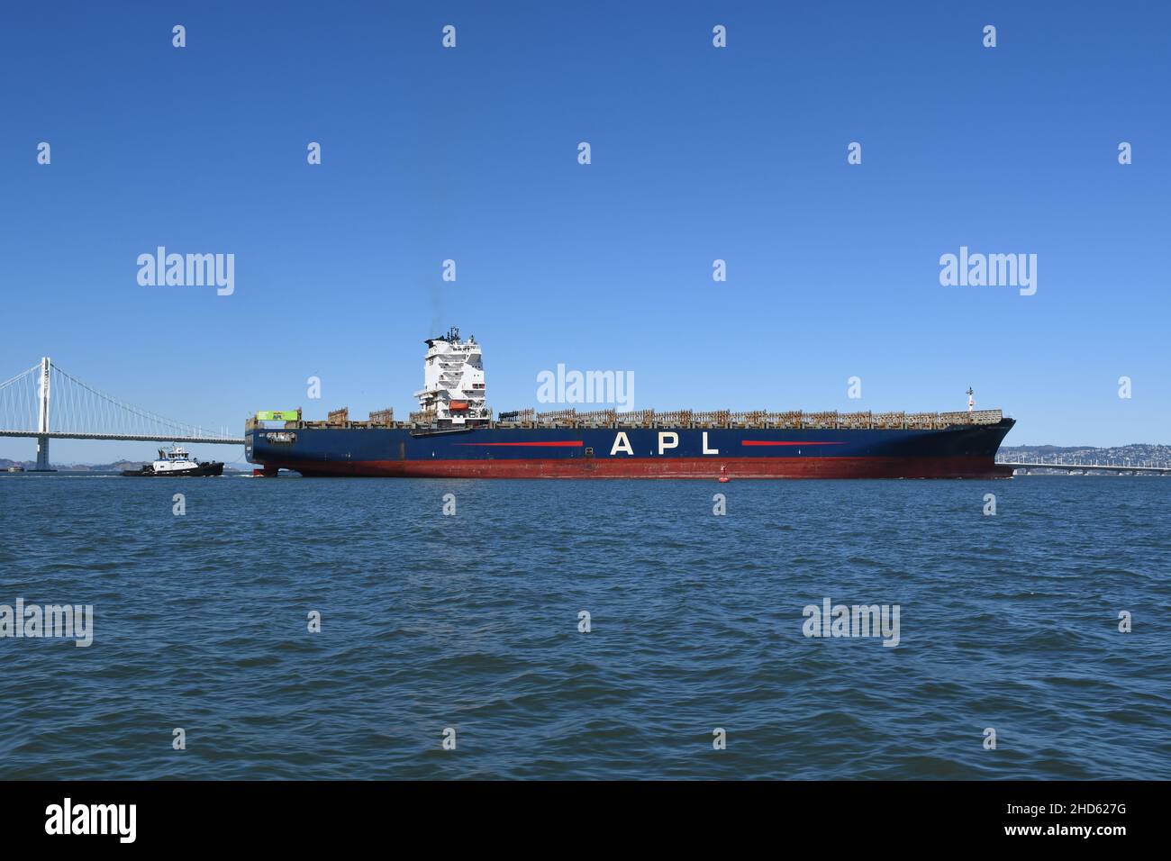 Rare empty APL container ship entering Port of Oakland. Commercial freight and container ships in San Francisco Bay, California Stock Photo