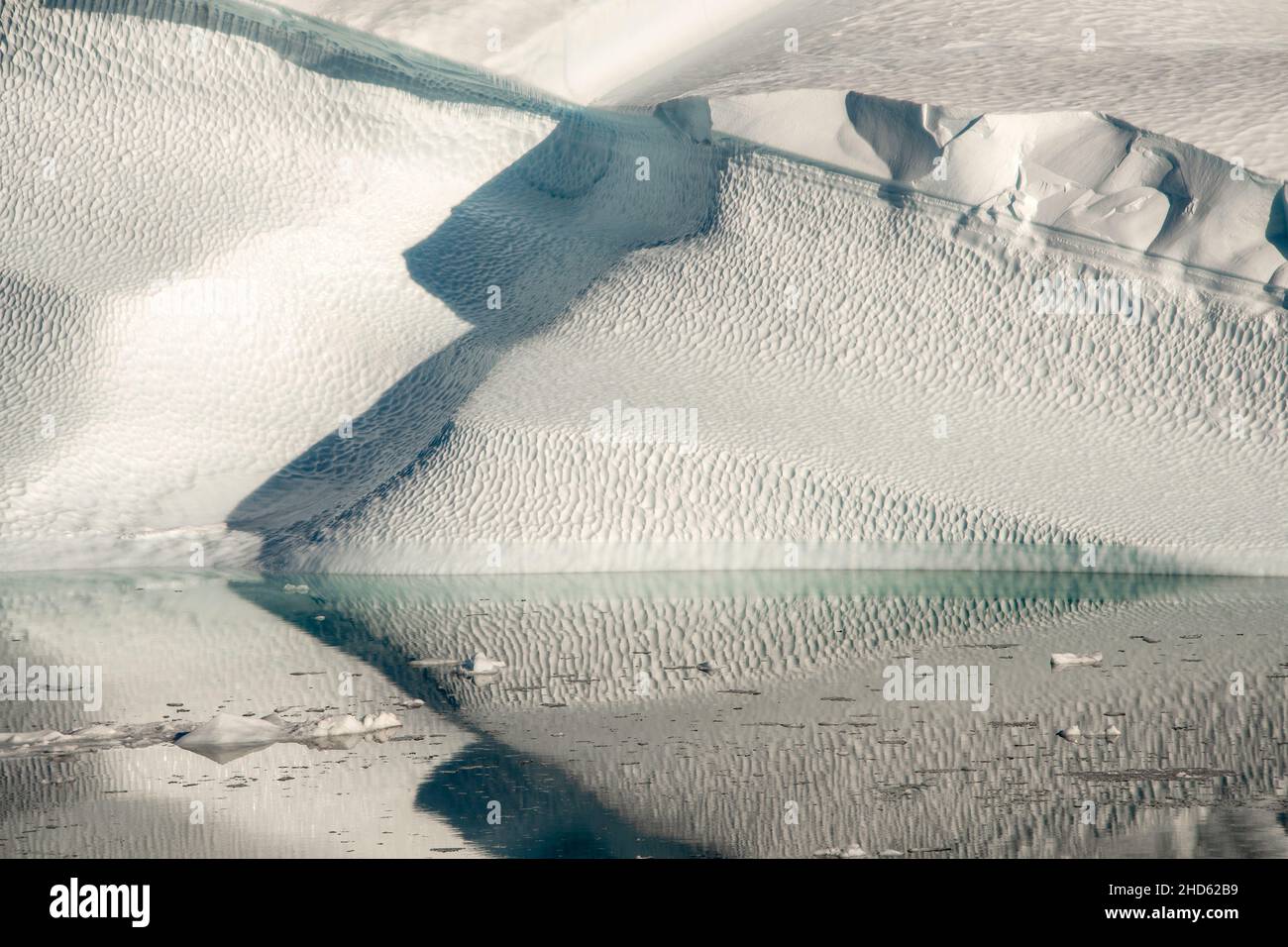 Iceberg textures and reflections, Rodefjord, Scoresby Sund, East Greenland Stock Photo
