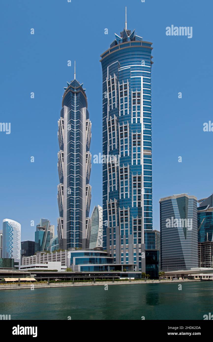 Two modern skyscrapers with sharp clean lines Dubai Canal Business District Dubai Stock Photo