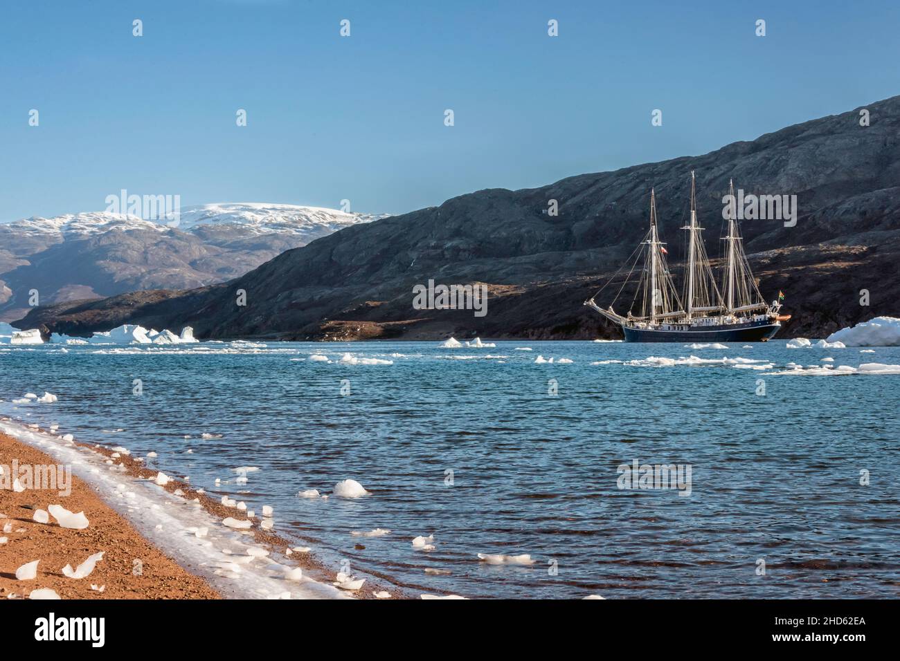 Rembrandt van Rijn off the red beach on Rode O, next to Milne Land, Rodefjord, Scoresby Sund, Greenland Stock Photo