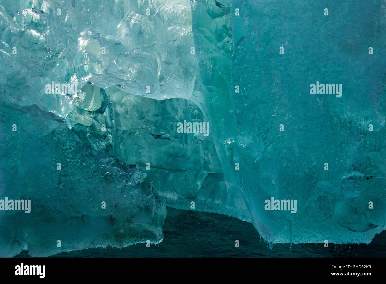 Luminescent blue iceberg, Rodefjord, Scoresby Sund, East Greenland Stock Photo