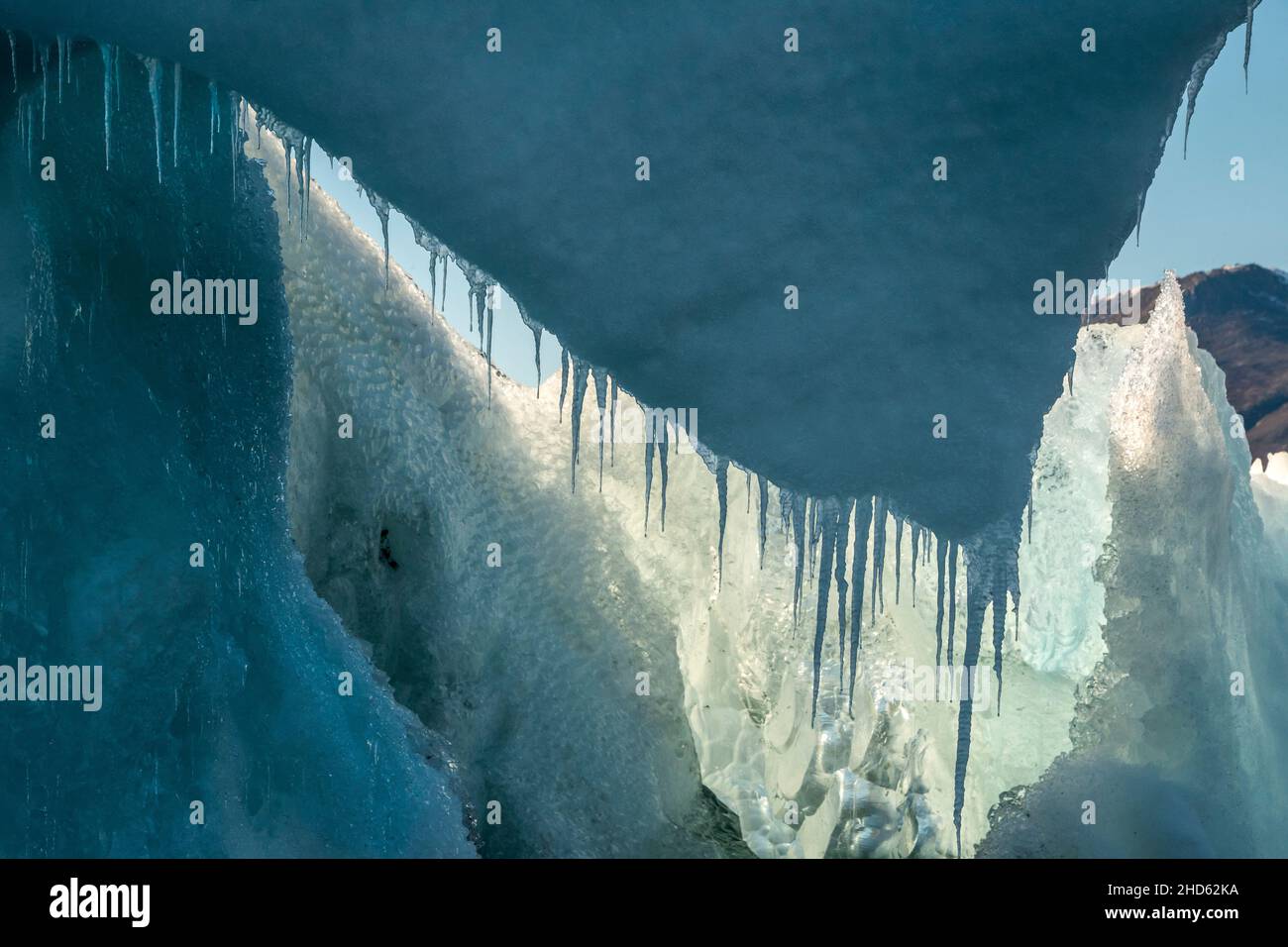 Dripping icicles, old iceberg, Rodefjord, Scoresby Sund, East Greenland Stock Photo