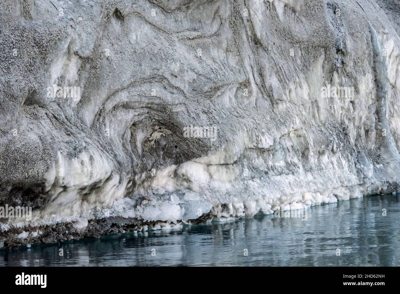 Rolige Brae lateral moraine with sand-coated ice, Rodefjord, Scoresby Sund, East Greenland Stock Photo