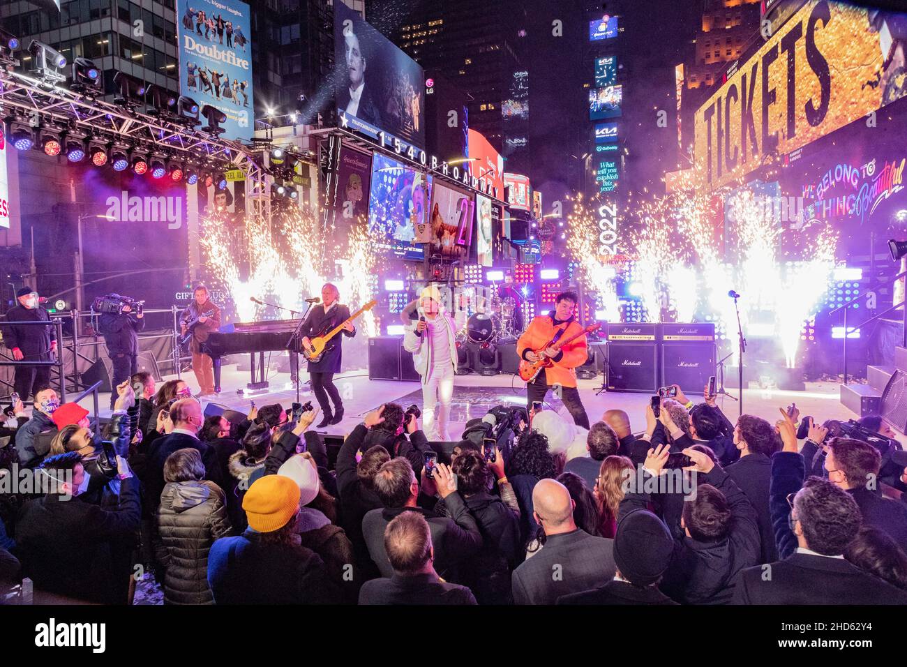 New York, NY December 31, 2021 Arnel Pineda (white coat) and Neal