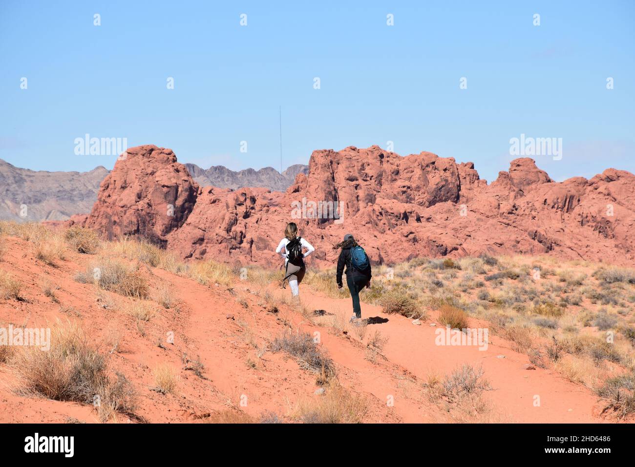 Two female hikers at the Valley of Fire State Park, Nevada, USA Stock