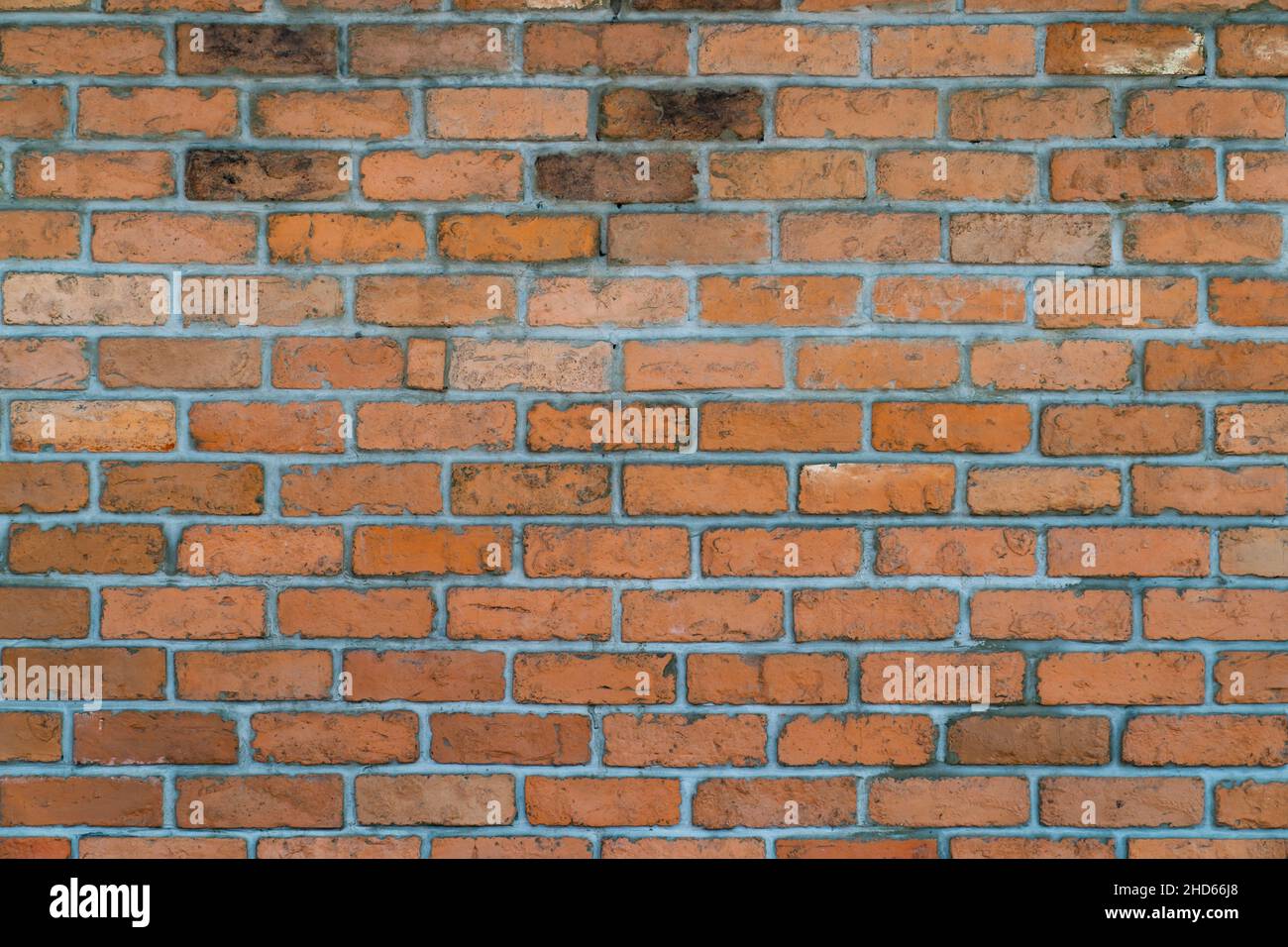 Brick wall wallpaper texture clinker and concrete pattern in old vintage  red and brown colour theme under the constuction area Stock Photo - Alamy