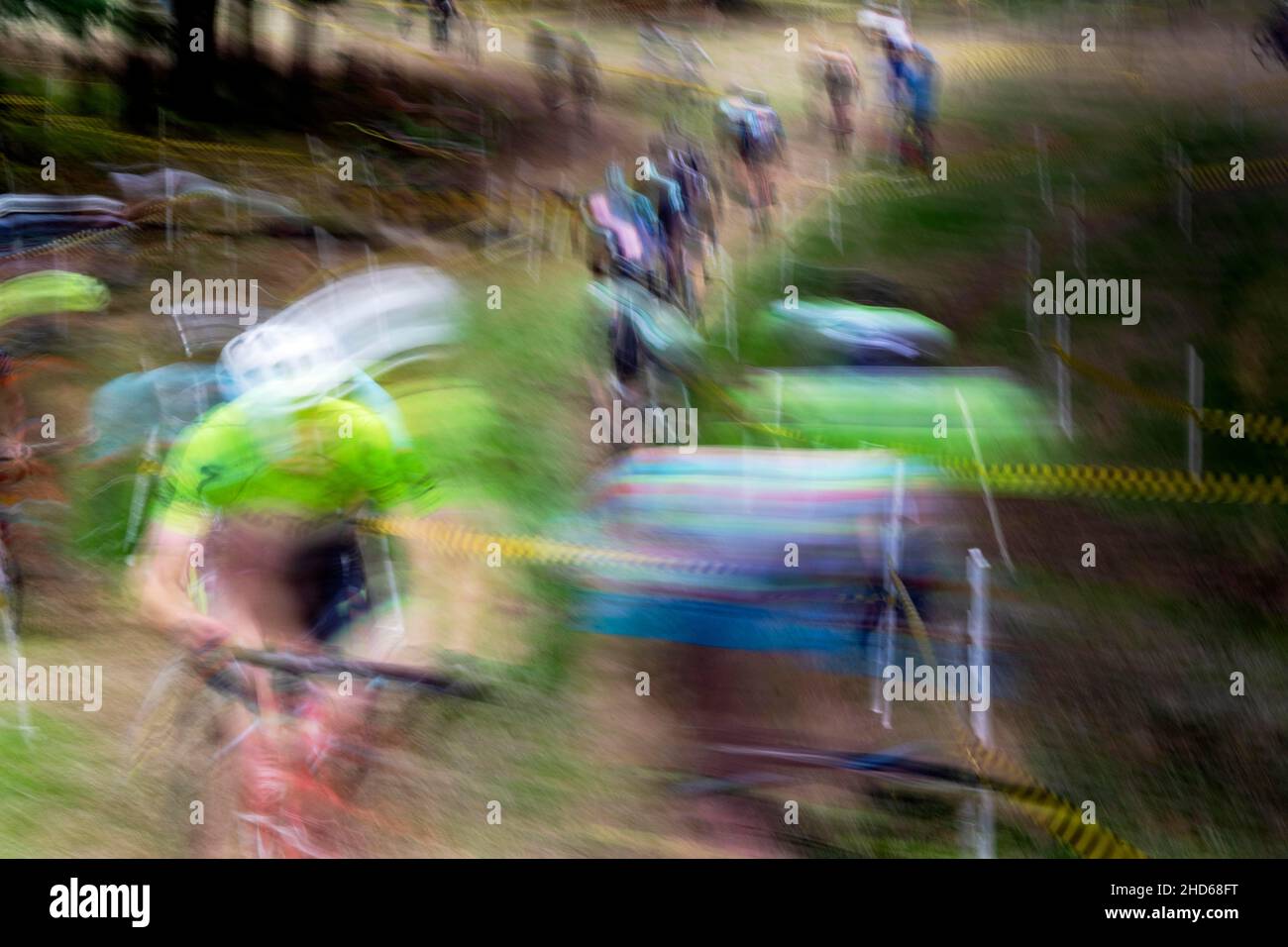 WA20594-00....WASHINGTON - Blured abstract of a men's cyclocross race. Stock Photo