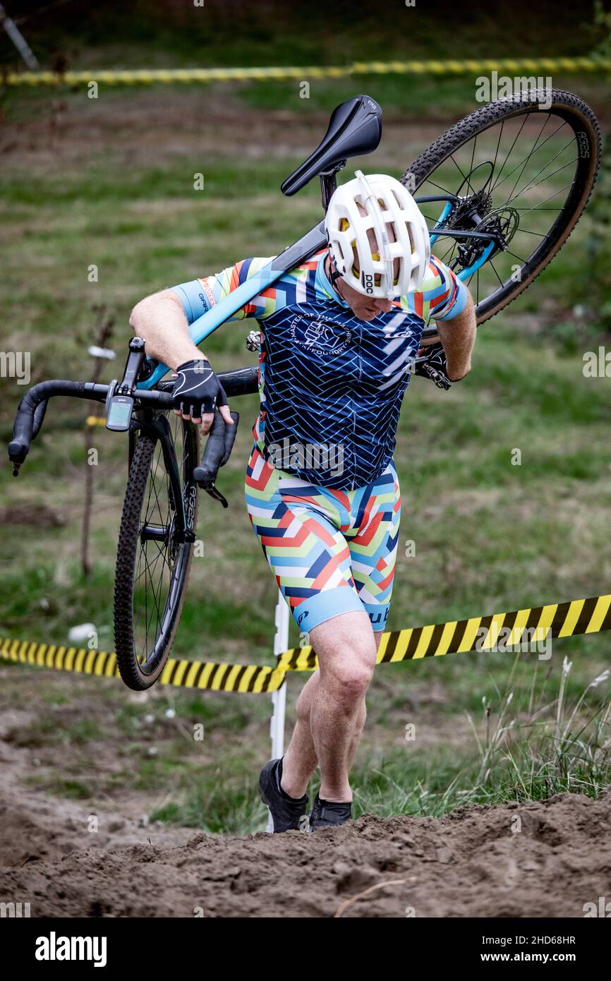 WA20597-00....WASHINGTON - Hill climb of a men's cyclocross race. Stock Photo