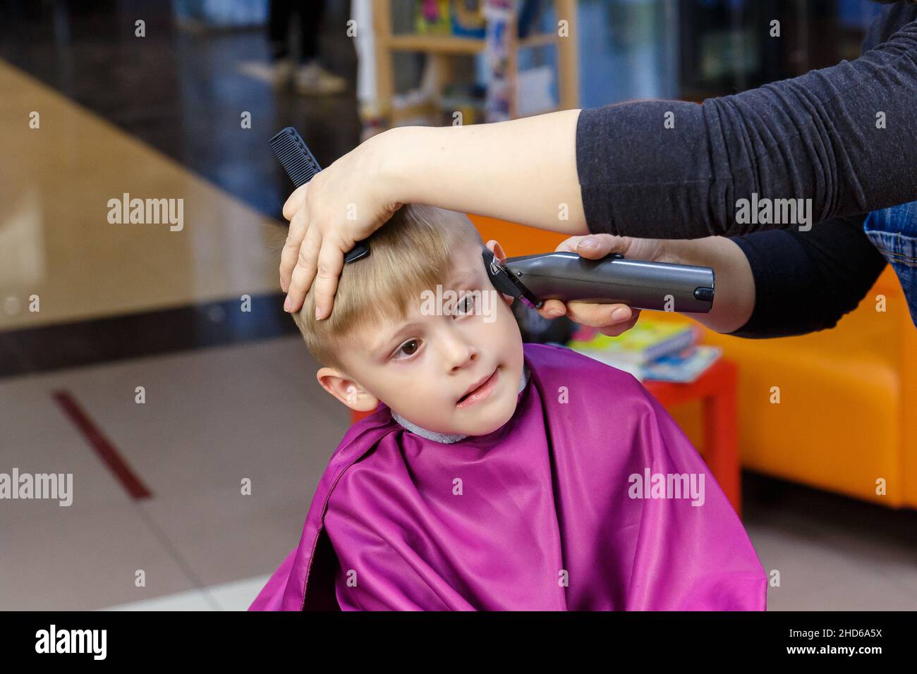 The concept of children's hairdressers for young children Stock Photo