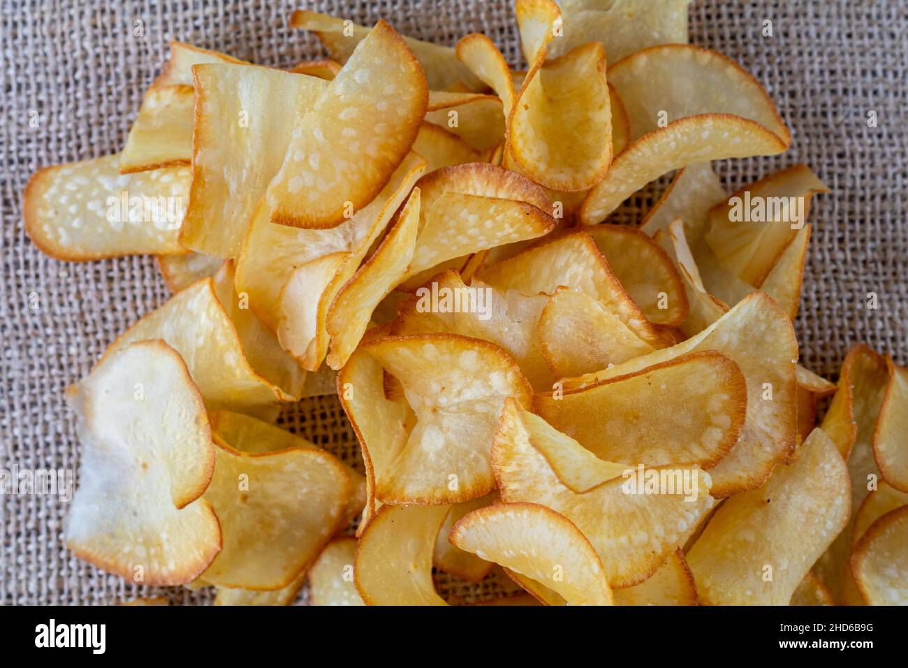 Savory salted cassava chips, a traditional Indonesian snack. Stock Photo