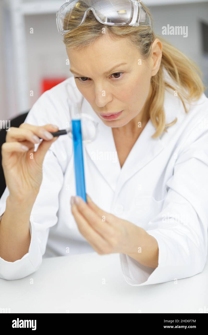 female chemist wearing safety glasses in a lab Stock Photo Alamy