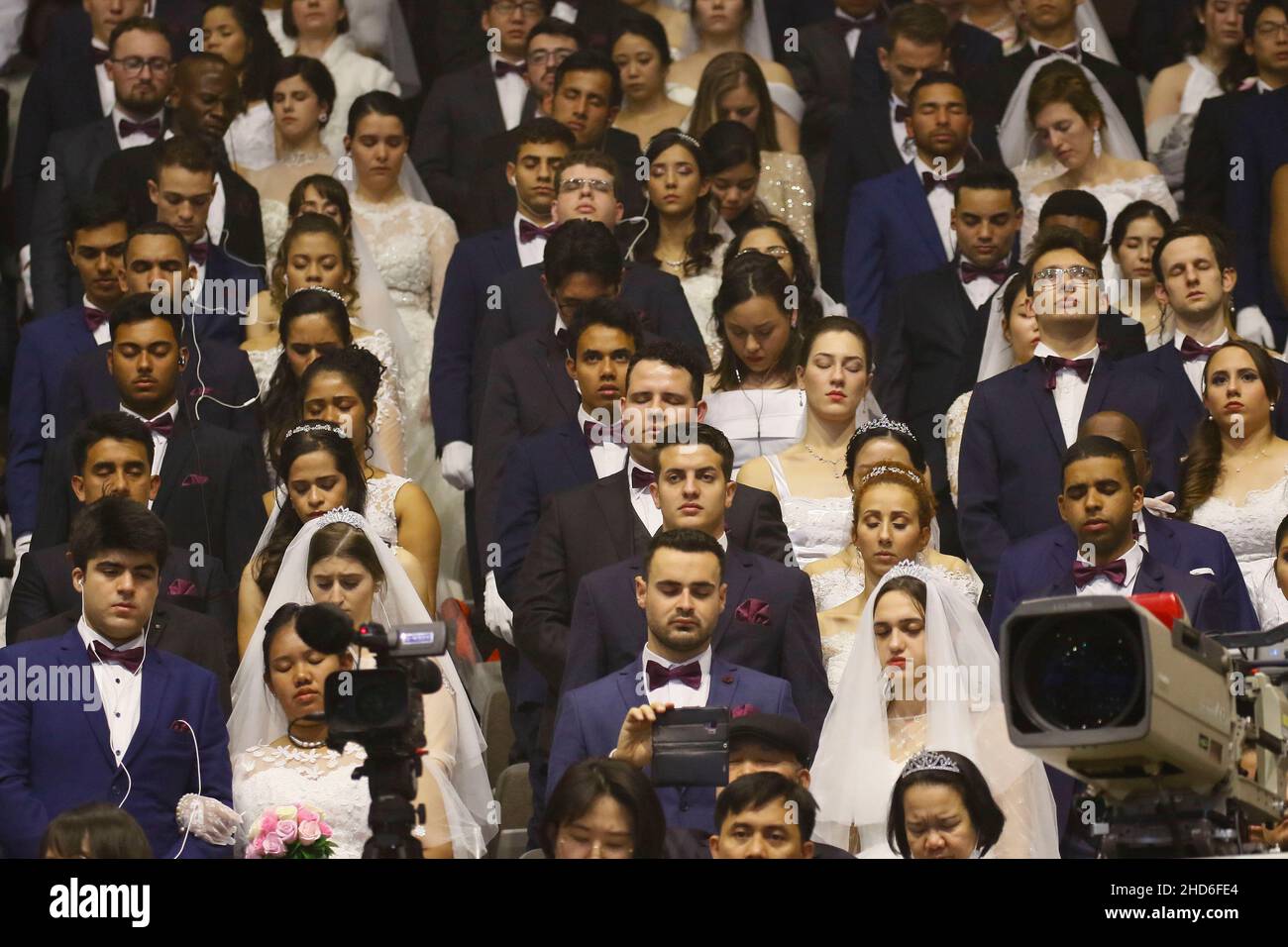 Feb 07, 2020-Gapyeong, South Korea-Thousands of couples take part in a mass wedding of the Family Federation for World Peace and Unification, commonly known as the Unification Church, at Cheongshim Peace World Center in Gapyeong-gun, South Korea. Stock Photo
