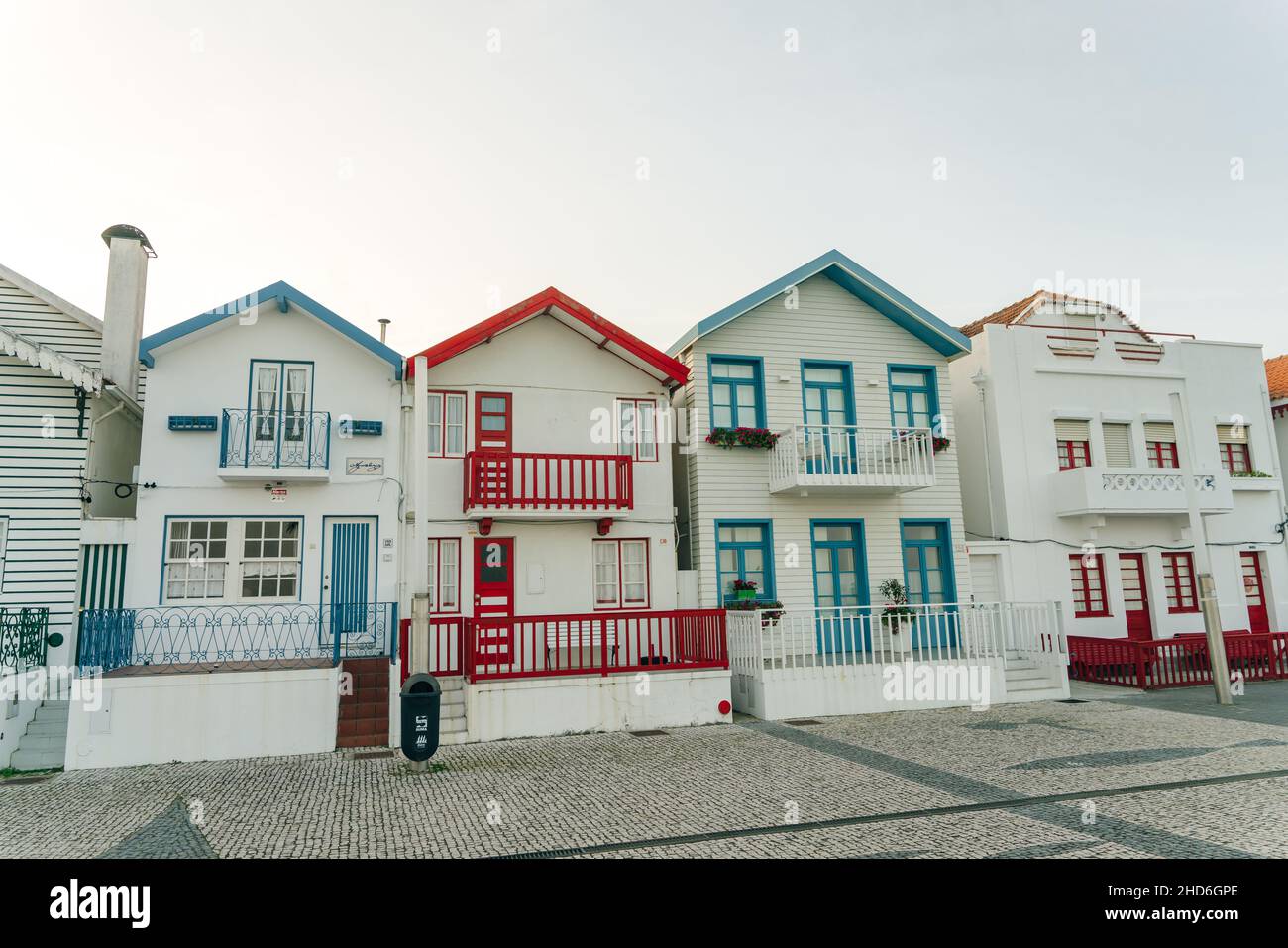 Street with colorful houses in Costa Nova, Aveiro, Portugal - november, 2021. High quality photo Stock Photo