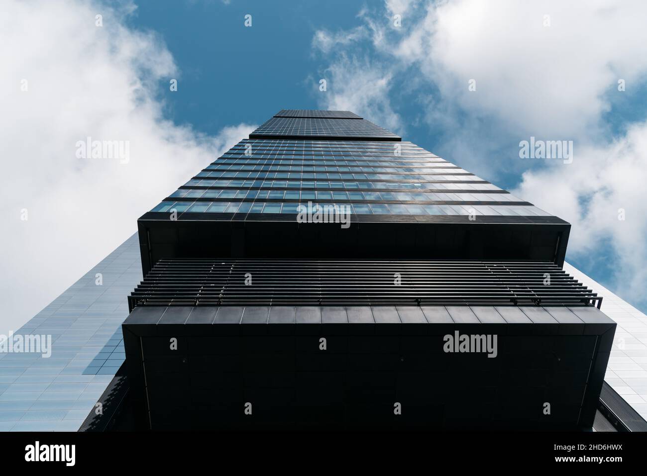 Madrid, Spain - December 5, 2021: Cepsa Tower in Cuatro Torres Business Area. Skyscraper against sky Stock Photo