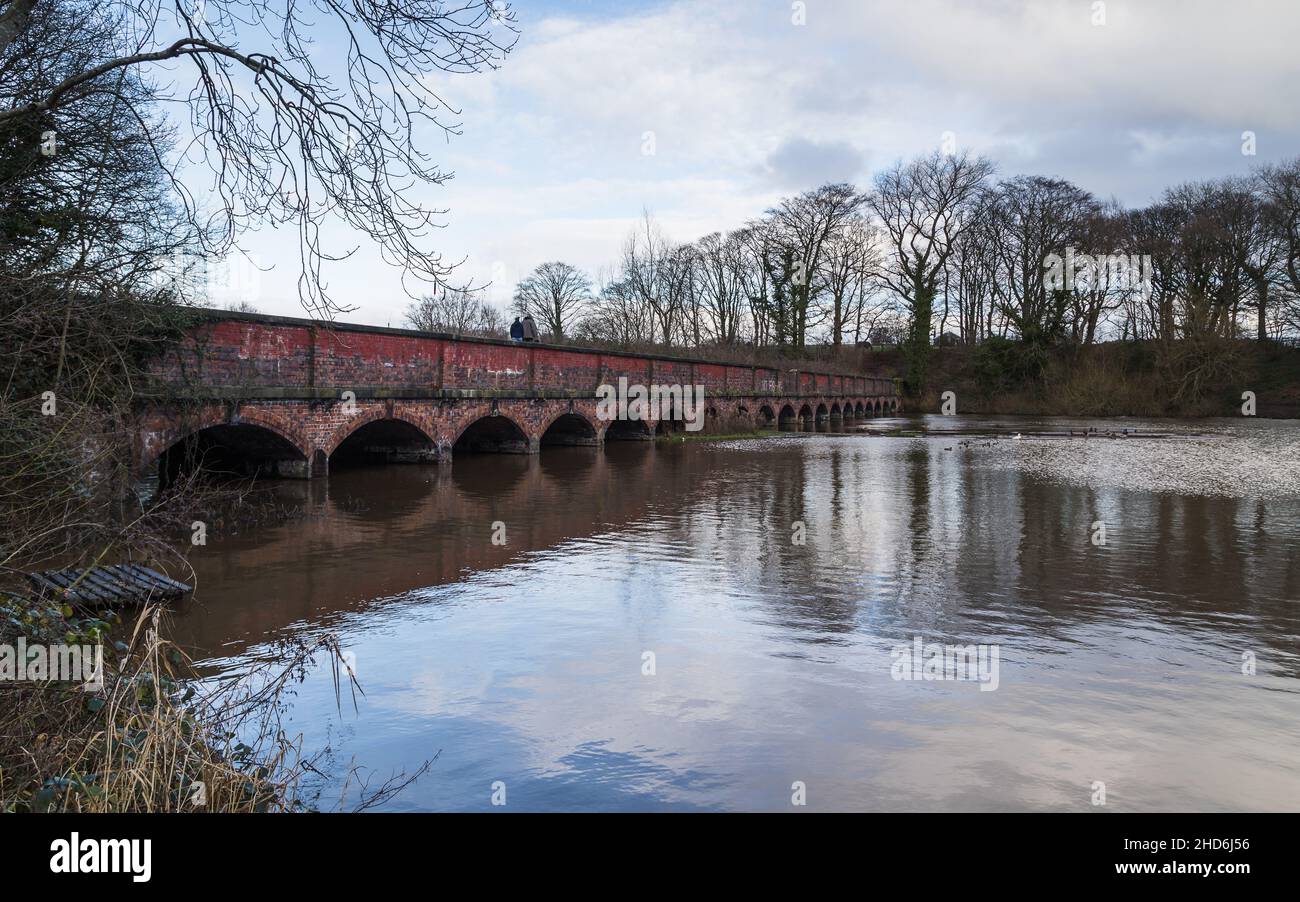 Nineteen Arches bridge spanning the Carr Mill Dam near St Helens in Merseyside. Stock Photo