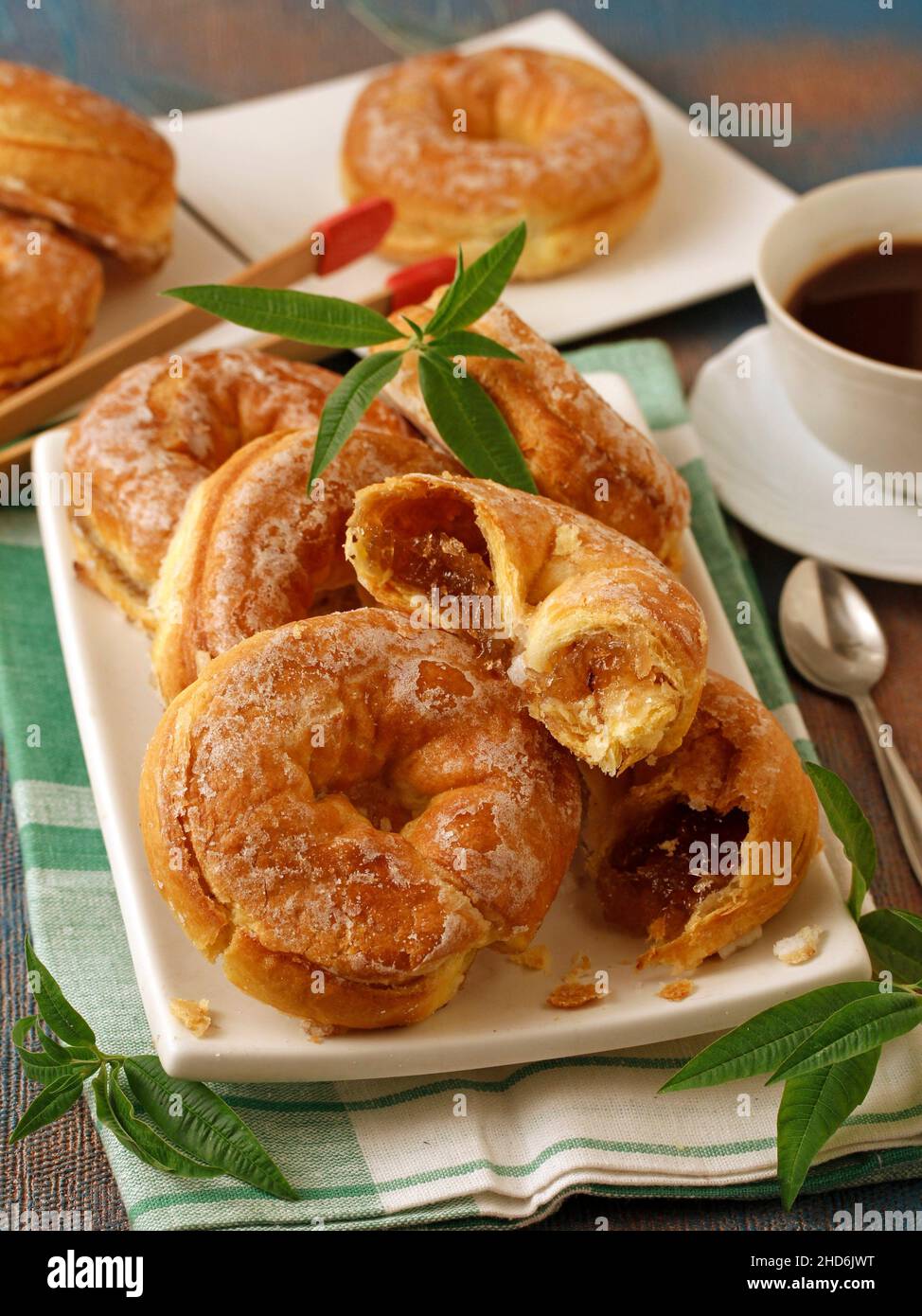 Puff pastry donuts stuffed with pumpkin jam. Stock Photo