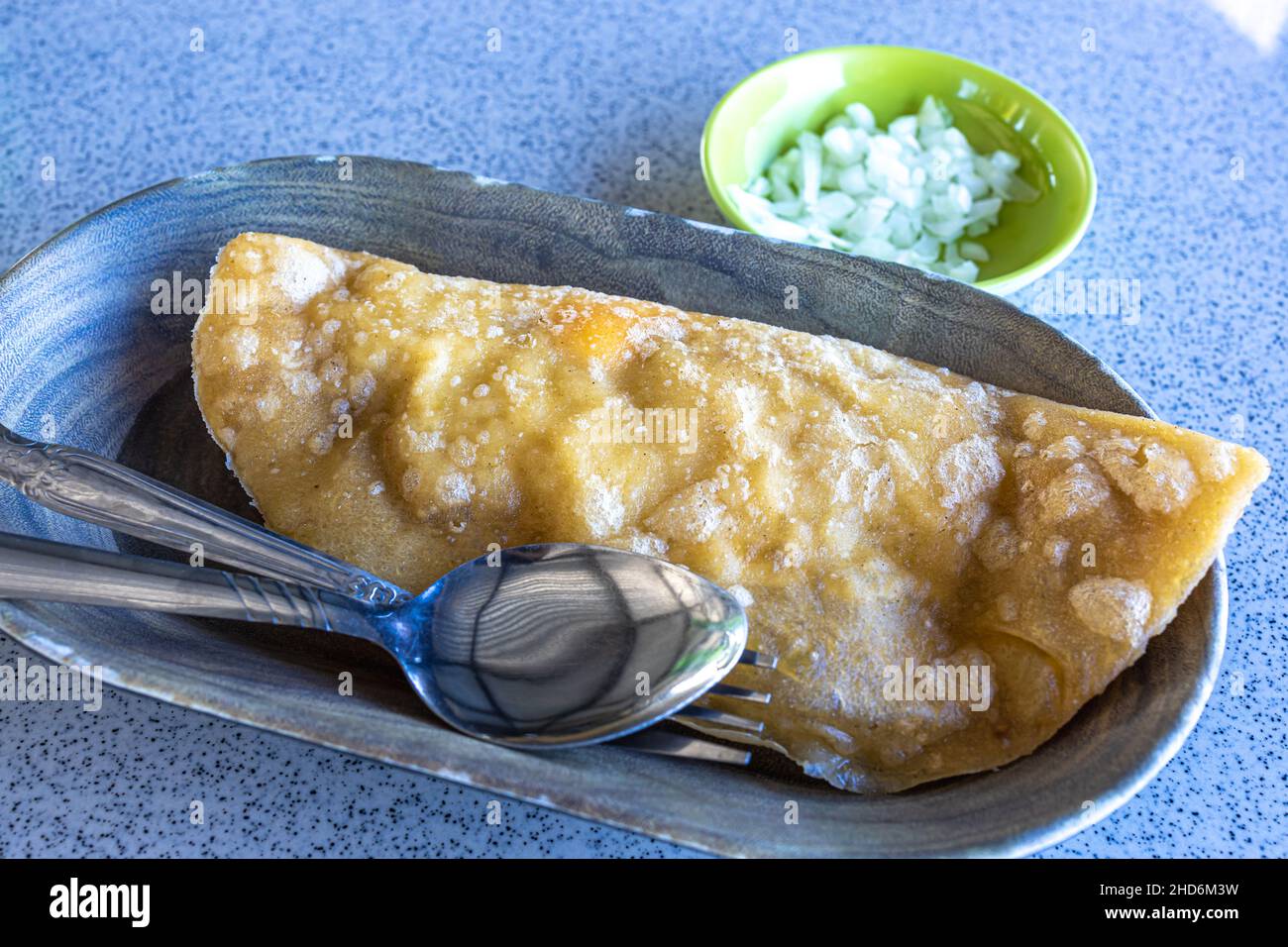 Popular Filipino snack empanada at the Restaurant Stock Photo