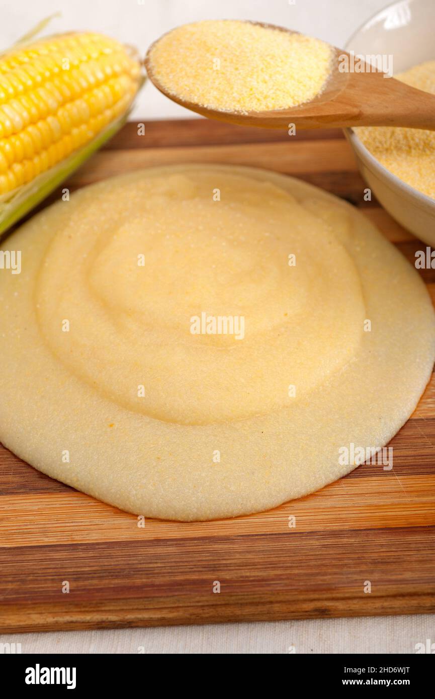 polenta traditional north Italy corn mais flour cream with crop Stock