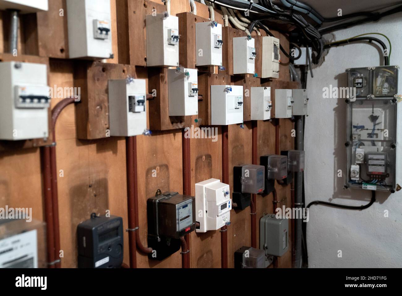 Group of electrical circuit breakers in disuse. Stock Photo
