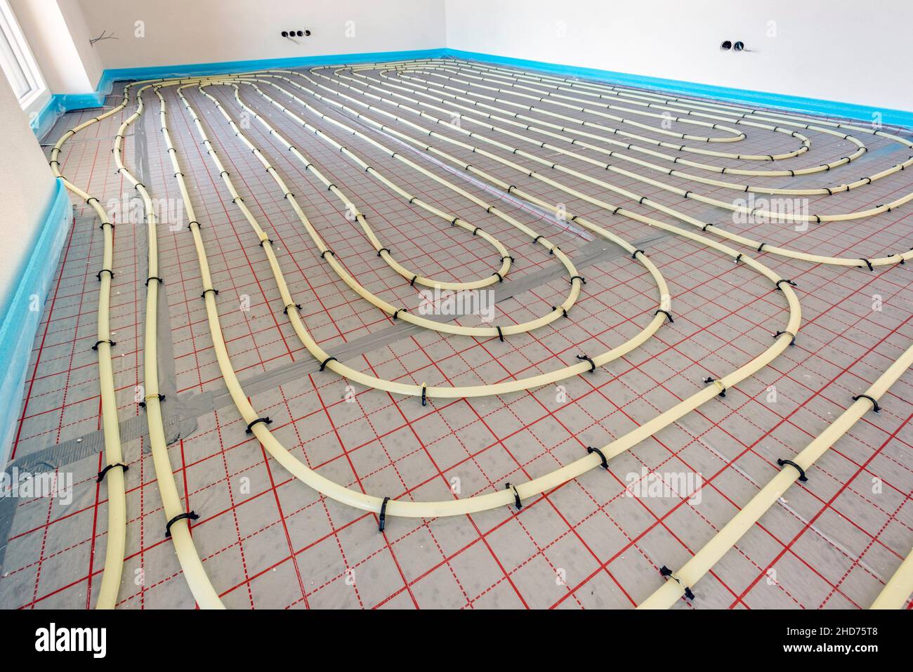 underfloor heating in construction of new residential house. Stock Photo