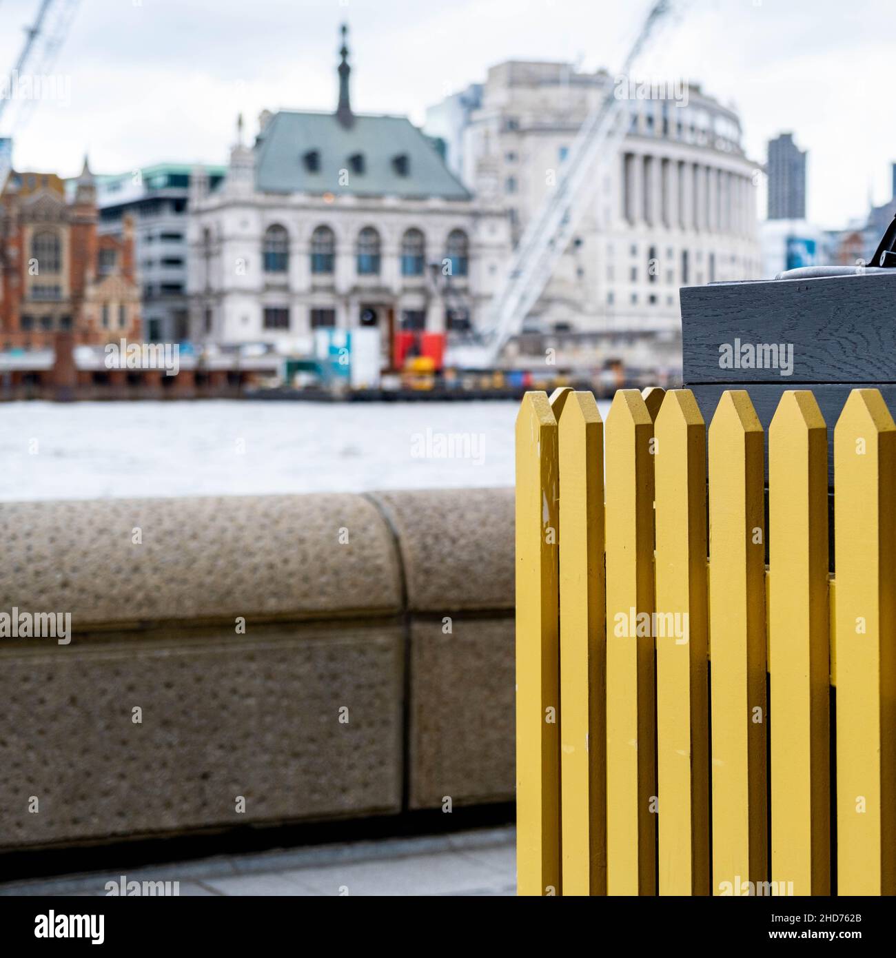 London England UK January 02 2022, Painted Colourful Yellow Fence Riverside Southbank London Close Up With No People Stock Photo