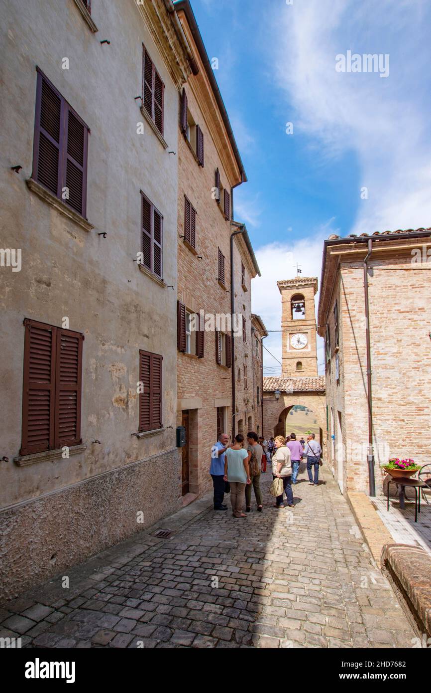 Foreshortening, Tourists Visiting the Village of Loretello, Arcevia, Marche, Italy, Europe Stock Photo