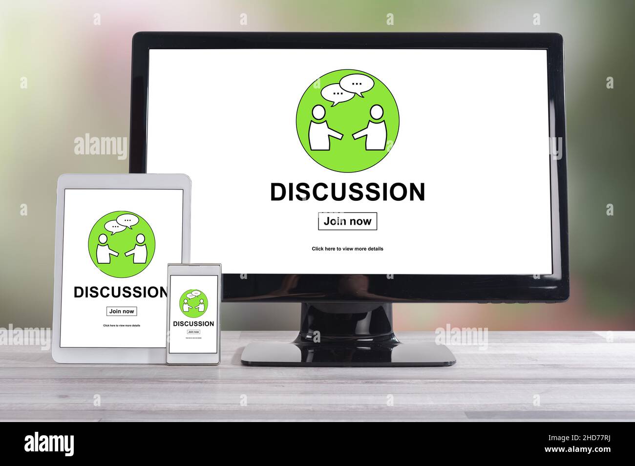 Discussion concept shown on different information technology devices Stock Photo