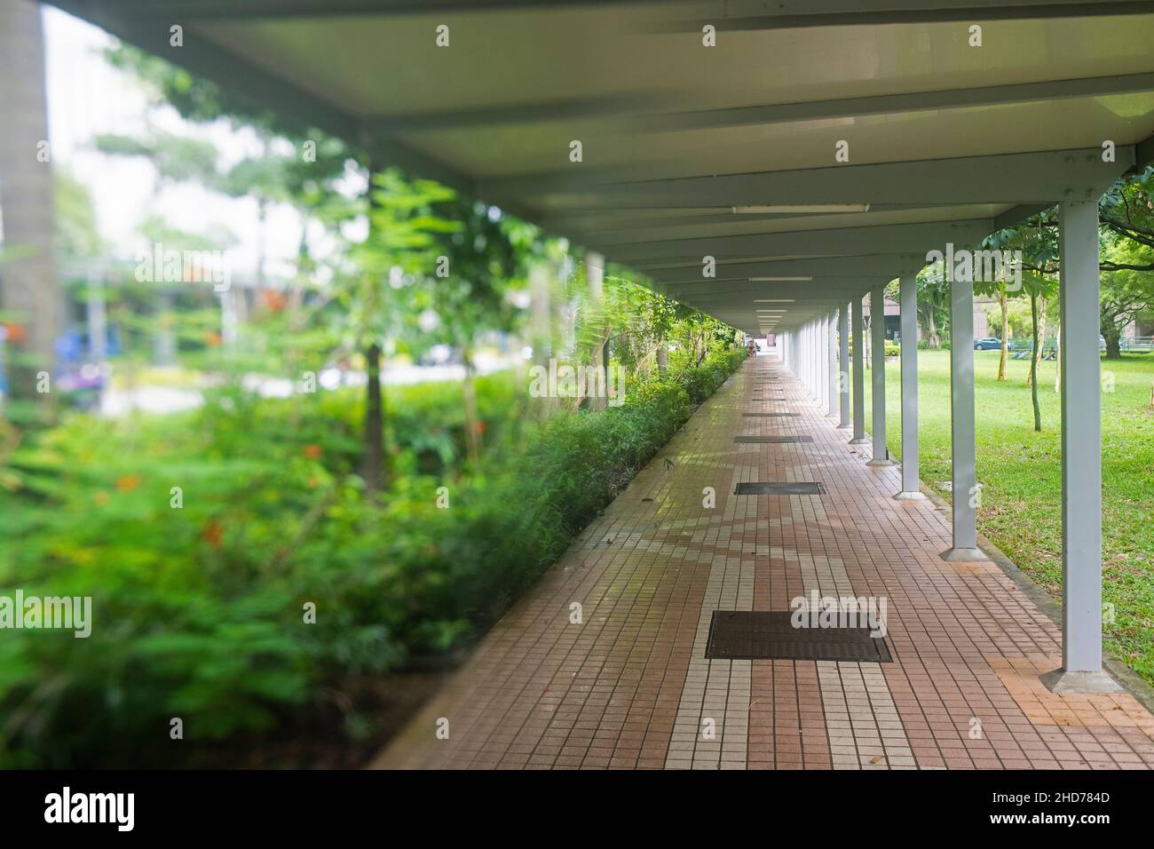Covered pedestrian walkway in Singapore along Orchard Road Stock Photo