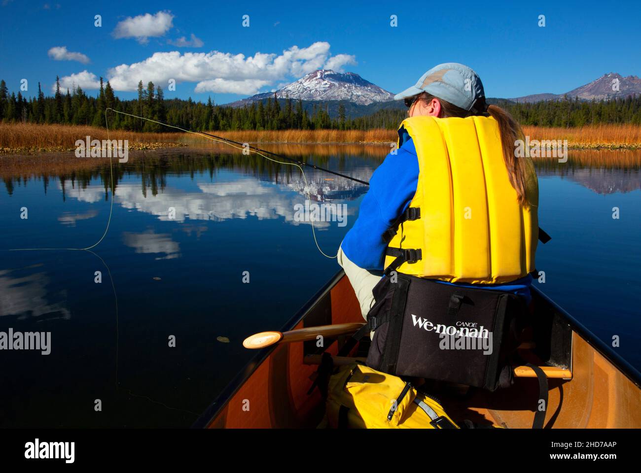 Canoeing Hosmer Lake with South Sister, Cascade Lakes National Scenic Byway, Deschutes National Forest, Oregon. Stock Photo