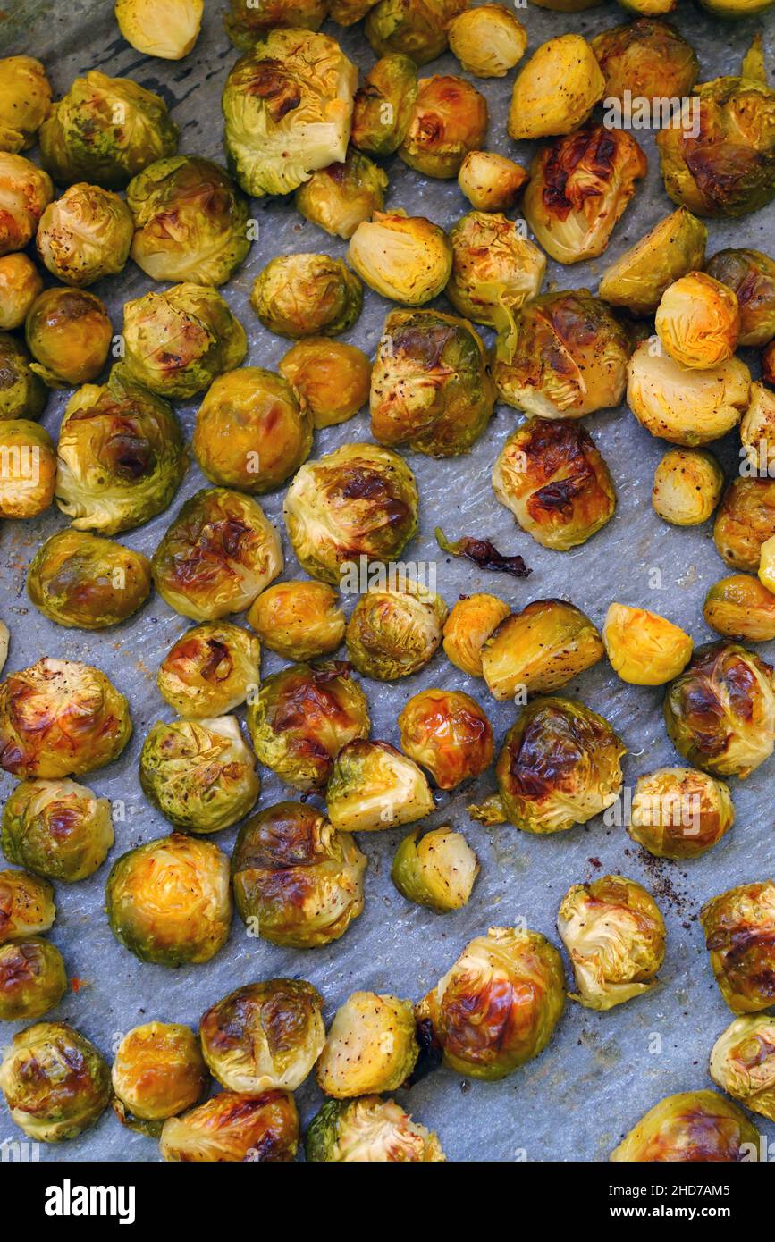 Brussels sprouts roasted in the oven on parchment paper Stock Photo Alamy
