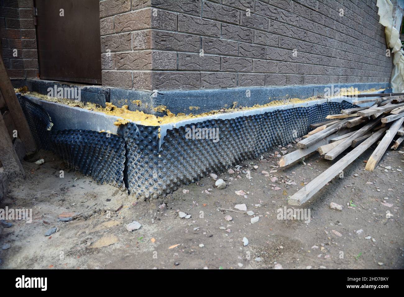 Foundation, basement waterproofing: bitumen, spray on tar and polystyrene  foam boards foundation coatings for an energy-efficient and waterproof  house Stock Photo - Alamy