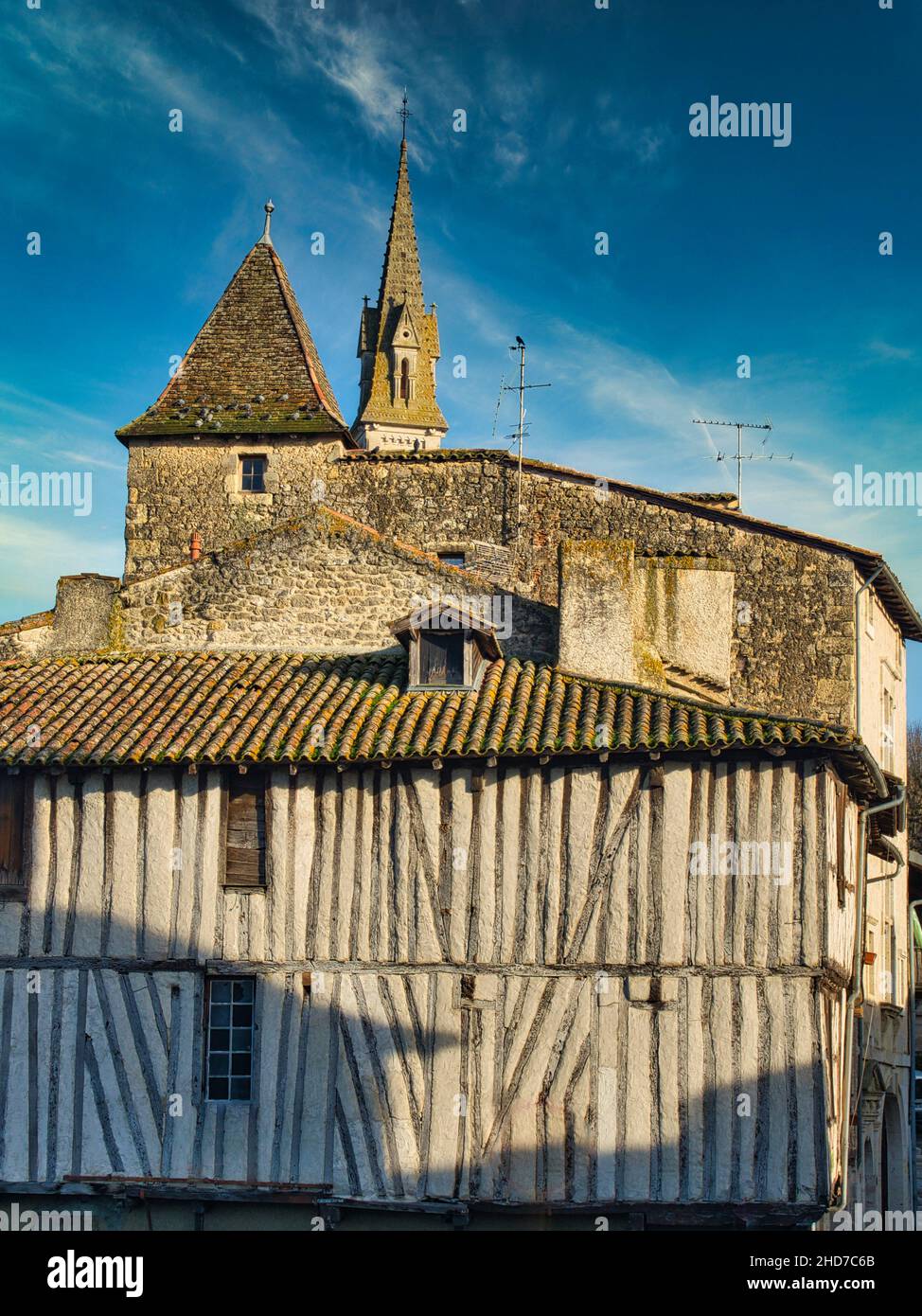 medieval architecture with steeple of Notre Dame de Nerac Church, Nerac