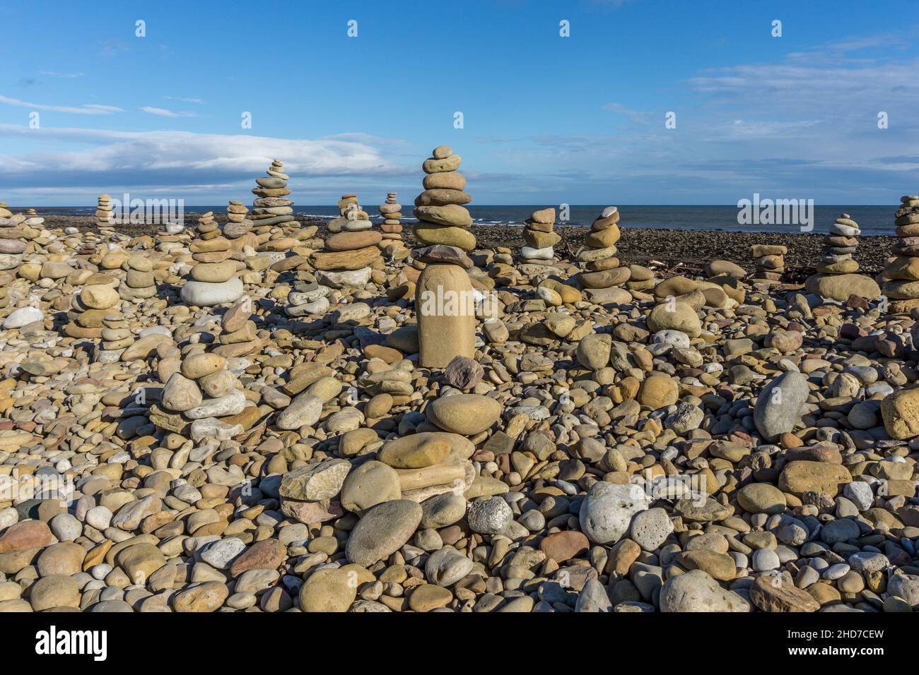 Small Cairns on Holy Island, Northumberland, England, UK Stock Photo