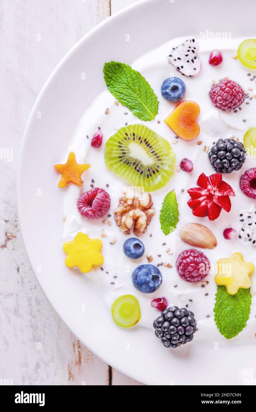Organic Greek yoghurt with dry coconut, almonds, nuts, sesame, chia
