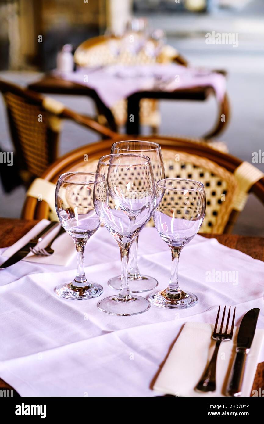wine glass on a table - french restaurant, Paris, France Stock Photo
