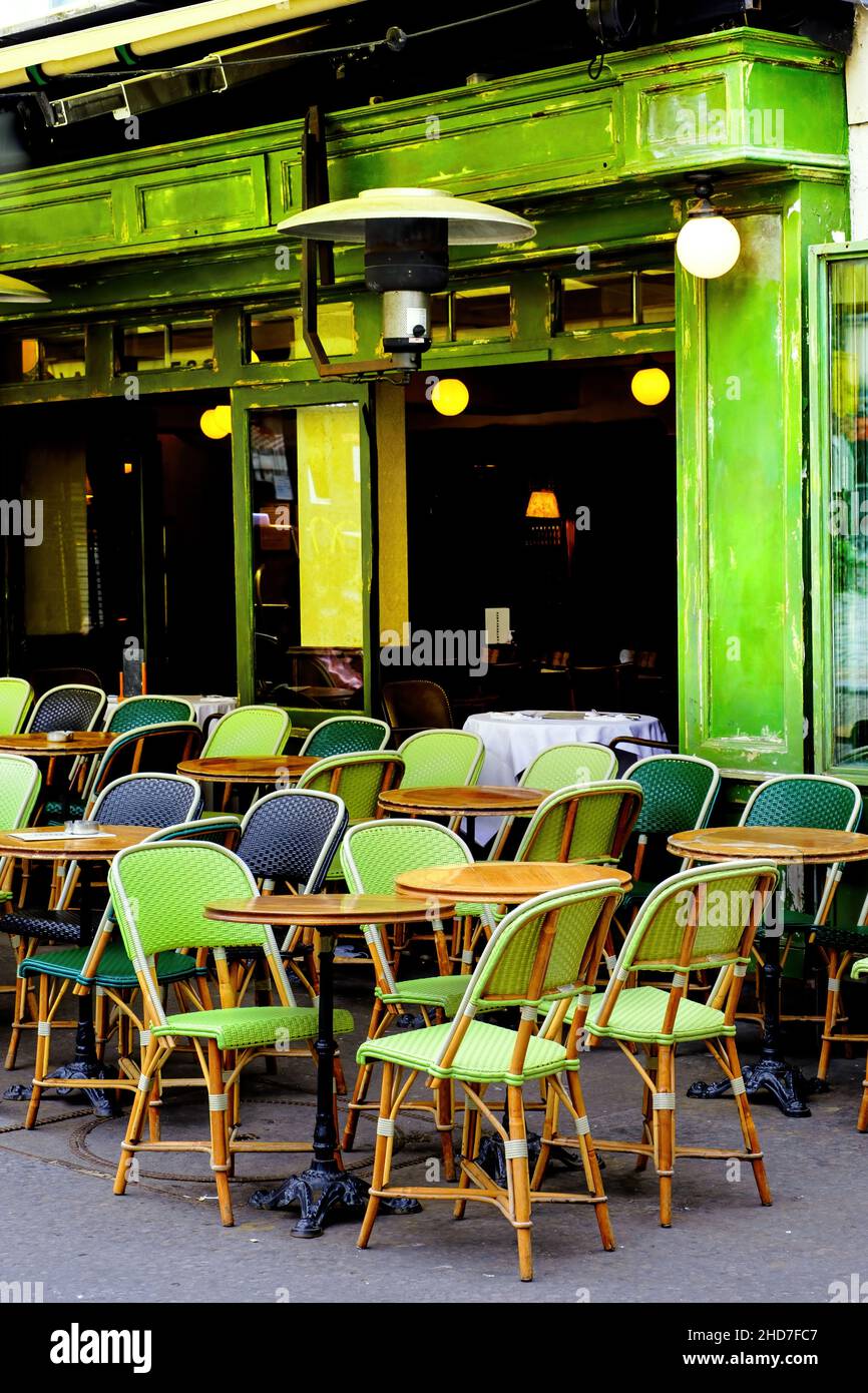 french restaurant - tables and chairs on the street - Paris, France Stock Photo