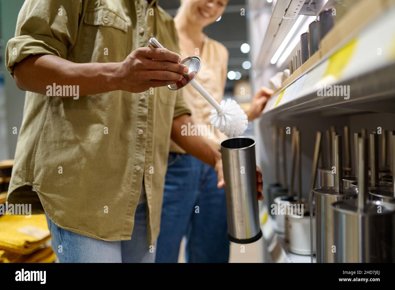 Young couple buying sanitary for new home Stock Photo