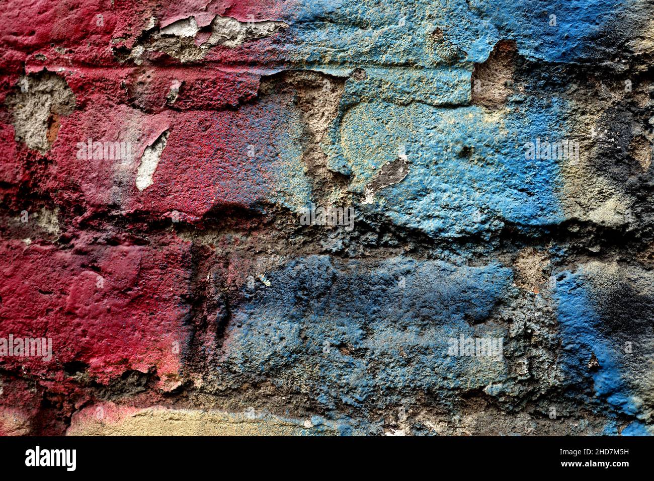 Close up of a peeling graffiti wall Stock Photo
